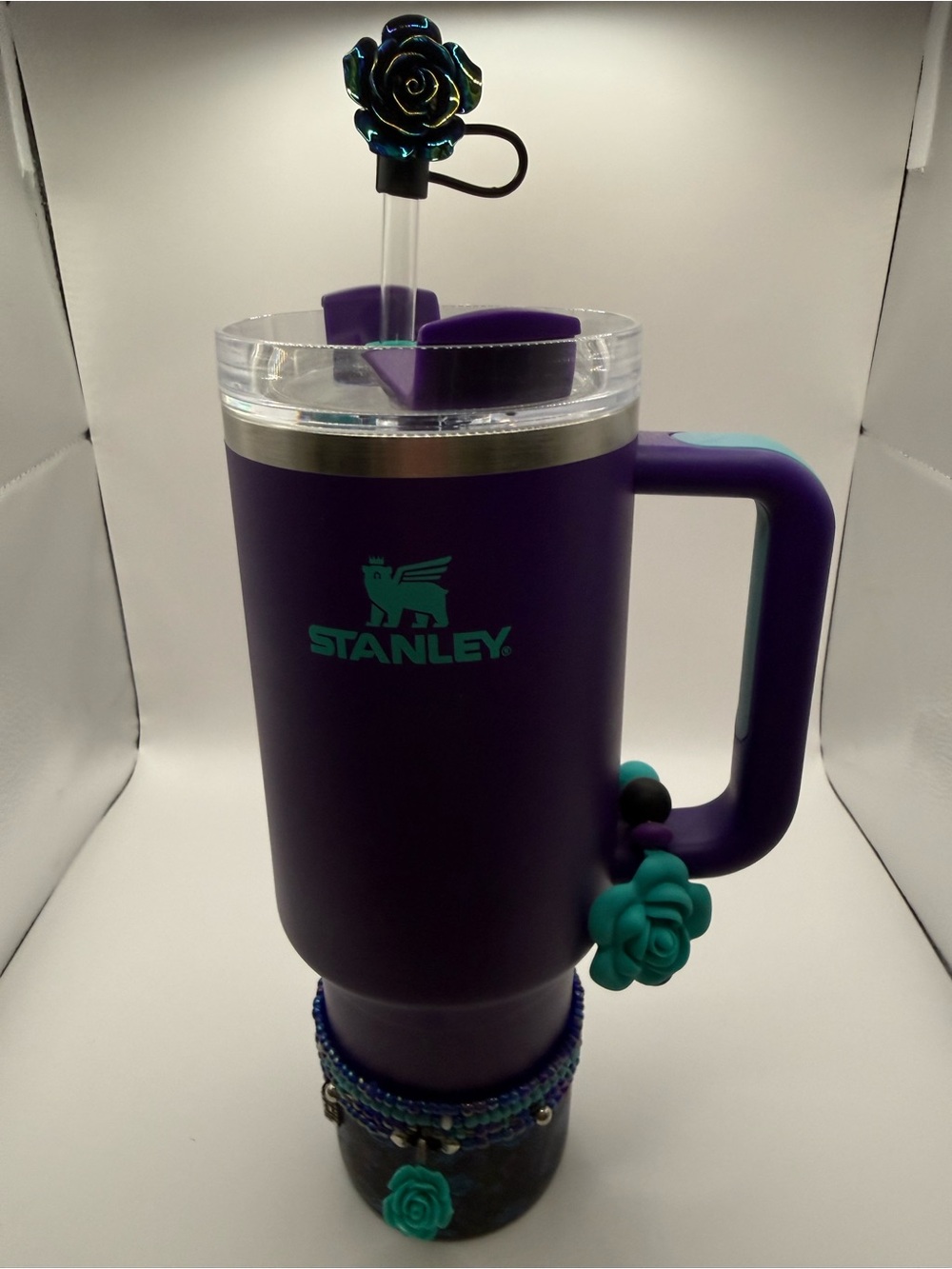 Gorgeous Stanley Purple Travel Mug with Teal Logo and Floral Accents